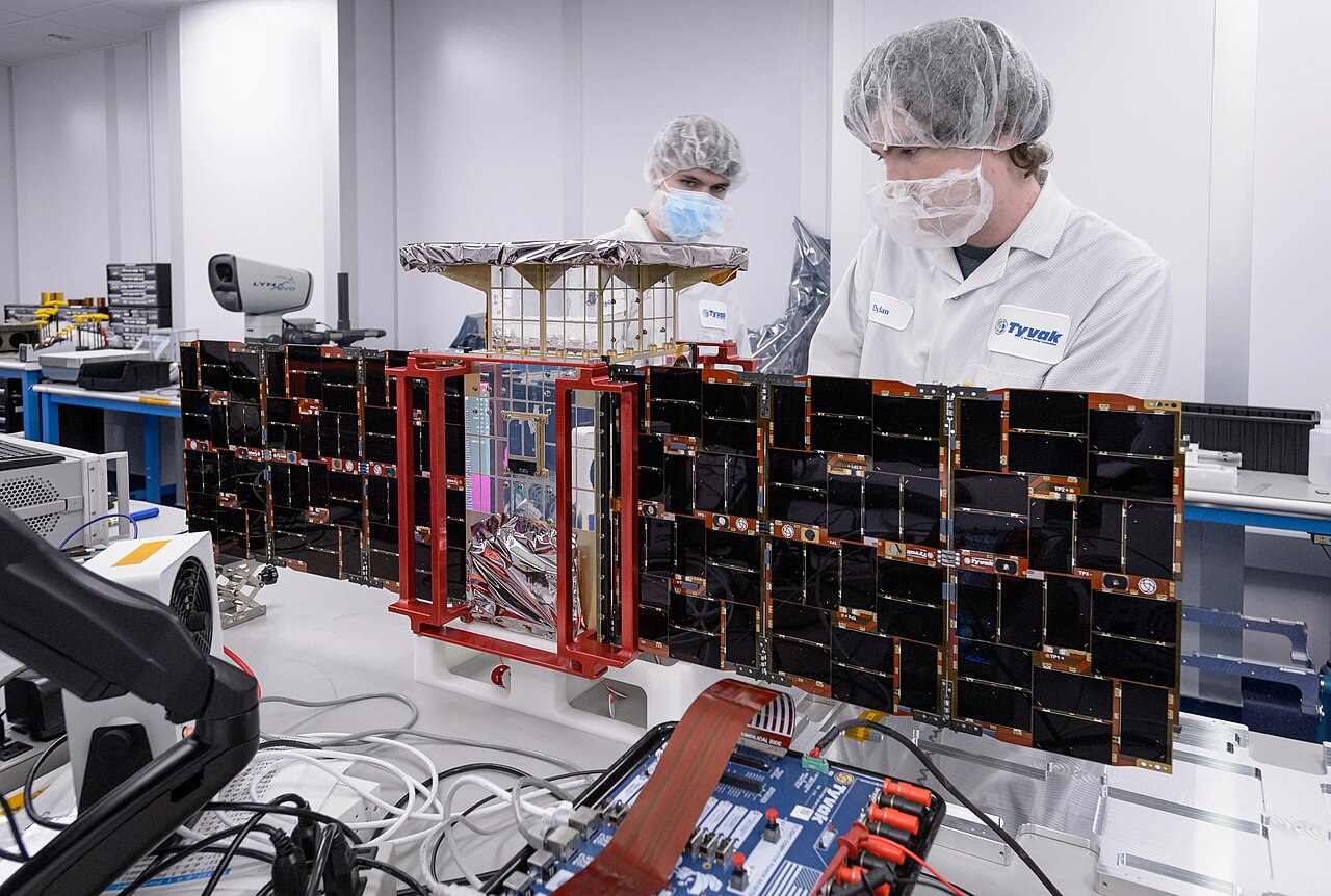 Tyvak engineers install solar panels onto the CAPSTONE spacecraft at Tyvak Nano-Satellite Systems, Inc., in Irvine, California.