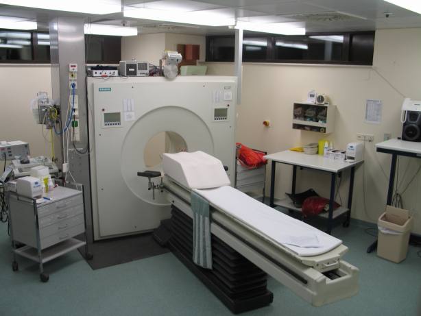 This image shows a picture taken from a typical PET facility equipped with an ECAT Exact HR+ PET scanner. PET scanners such as this are steadily being replaced by systems that combine both PET and CT scanners into a single PET/CT imaging de