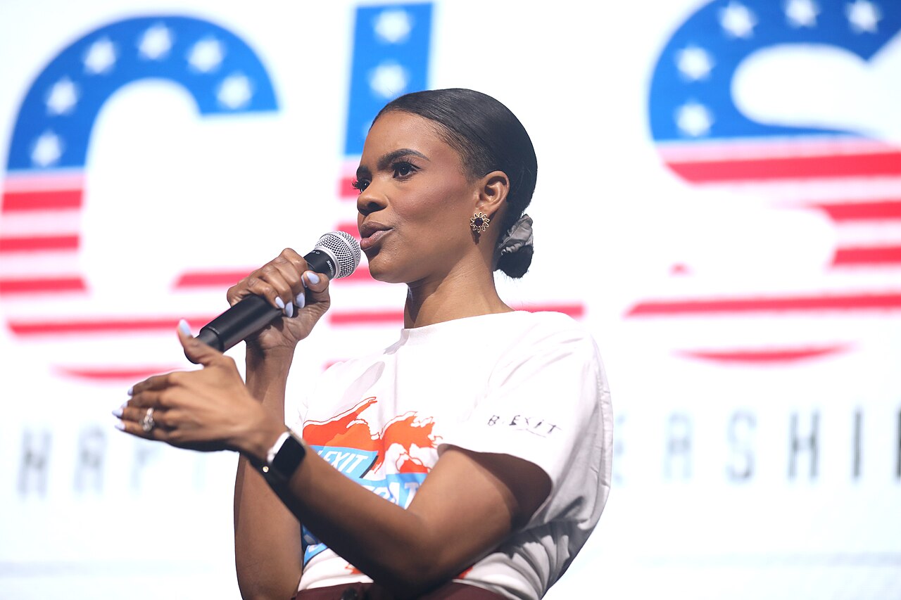 Candace Owens speaking with attendees at the 2024 Chapter Leadership Summit at Huntington Place in Detroit, Michigan.