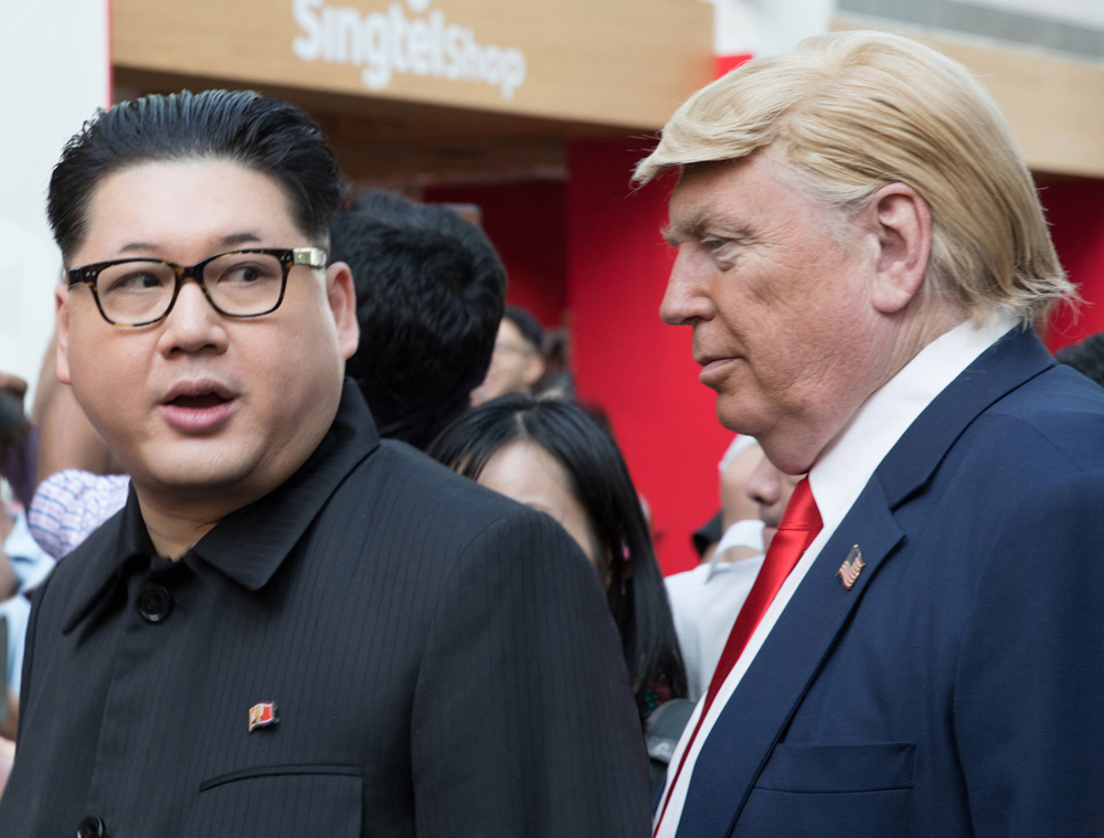 Howard X and Dennis Alan, impersonators of Kim Jong-un and Donald Trump during the 2018 North Korea–United States summit in Singapore