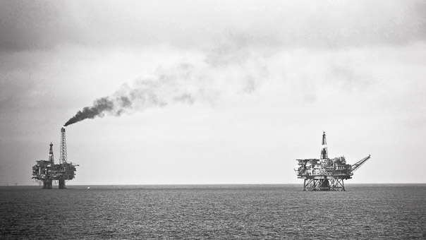 Oil platforms in the North Atlantic between Norway and Shetland, as seen from the ferry Norröna. Left: Brent B (Brent Bravo), Right: Brent A (Brent Alpha).