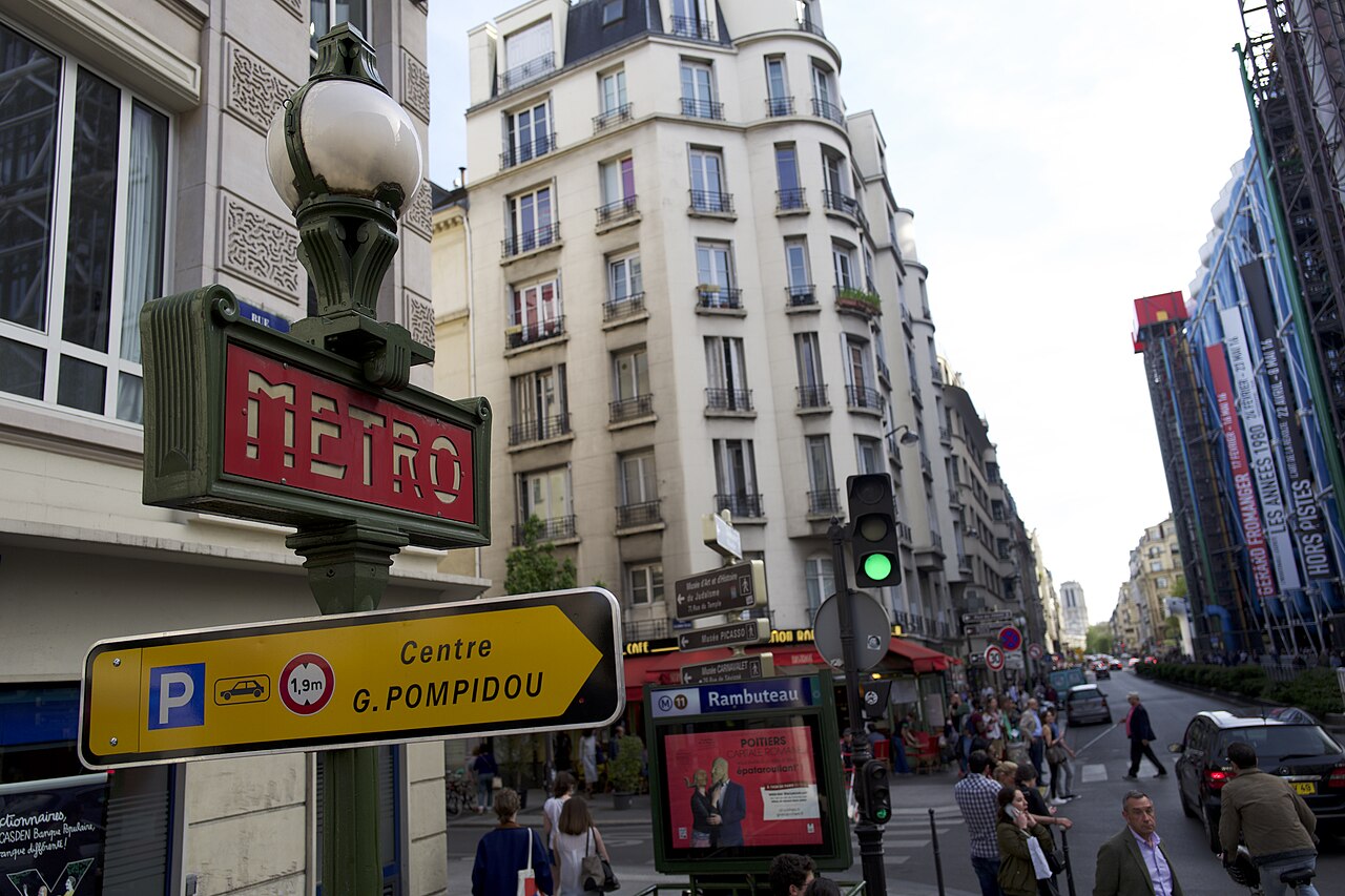 Métro station rue Rambuteau next to Centre Georges Pompidou at rue Rambuteau, in the background the City Hall and Notre Dame.